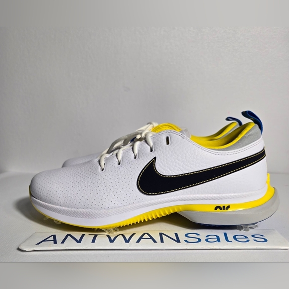 Nike White Sneakers with Black Swoosh and Yellow Highlights